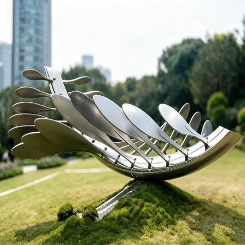 Hoe wordt een spiegelgepolijst roestvrijstalen ringsculptuur gemaakt en geïnstalleerd?